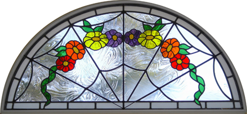 A favorite of ours, this stained glass piece brings beautiful florals into its imagery.